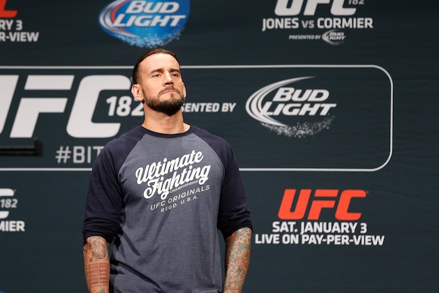 LAS VEGAS, NV - JANUARY 02:  Phil 'C.M. Punk' Brooks interacts with fans during a Q&A session before the UFC 182 weigh-in event at the MGM Grand Conference Center on January 2, 2015 in Las Vegas, Nevada. (Photo by Josh Hedges/Zuffa LLC/Zuffa LLC via Getty Images)