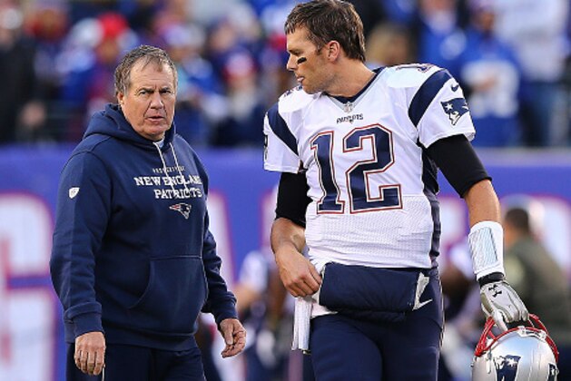 EAST RUTHERFORD, NJ - NOVEMBER 15: Tom Brady #12 of the New England Patriots speaks with head coach Bill Belichick prior to the game against the New York Giants at MetLife Stadium on November 15, 2015 in East Rutherford, New Jersey.  (Photo by Elsa/Getty Images)