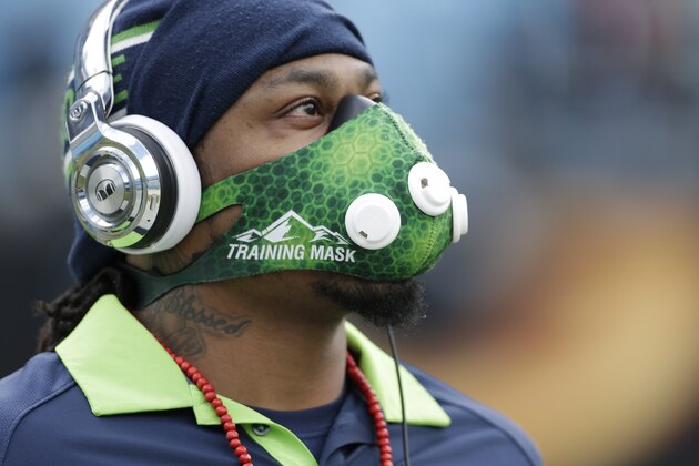 Seattle Seahawks running back Marshawn Lynch warms up before the first half of an NFL divisional playoff football game between the Carolina Panthers and the Seattle Seahawks, Sunday, Jan. 17, 2016, in Charlotte, N.C. (AP Photo/Bob Leverone)