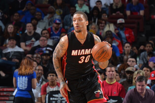 PHILADELPHIA,PA - APRIL 15: Michael Beasley #30 of the Miami Heat dribbles up court against the Philadelphia 76ers at Wells Fargo Center on April 15, 2015 in Philadelphia, Pennsylvania NOTE TO USER: User expressly acknowledges and agrees that, by downloading and/or using this Photograph, user is consenting to the terms and conditions of the Getty Images License Agreement. Mandatory Copyright Notice: Copyright 2015 NBAE (Photo by Jesse D. Garrabrant/NBAE via Getty Images)
