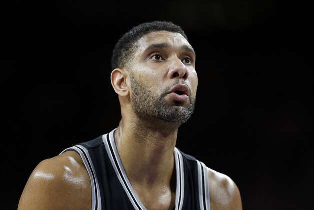 San Antonio Spurs' Tim Duncan prepares to shoot a free-throw against the Detroit Pistons during the first half of an NBA basketball game Tuesday, Jan. 12, 2016, in Auburn Hills, Mich. (AP Photo/Duane Burleson)