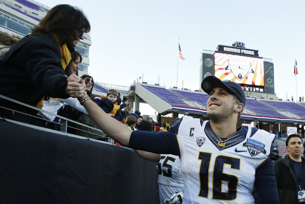 Dec 29, 2015; Fort Worth, TX, USA; California Golden Bears quarterback Jared Goff (16) shakes hands with a fan after defeating the Air Force Falcons at Amon G. Carter Stadium. California won 55-36. Mandatory Credit: Tim Heitman-USA TODAY Sports