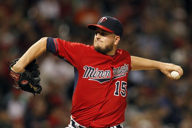 Minnesota Twins' Glen Perkins pitches in the ninth inning of a baseball game against the Cleveland Indians Friday, Aug. 7, 2015, in Cleveland. (AP Photo/Aaron Josefczyk