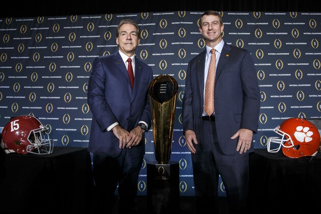 SCOTTSDALE, AZ - JANUARY 10: Head Coach Nick Saban of the Alabama Crimson Tide and Head Coach Dabo Swinney of the Clemson Tigers pose for the media after the Head Coaches Press Conference before the College Football Playoff National Championship at the JW Marriott Camelback Inn on January 10, 2016 in Scottsdale, Arizona. (Photo by Don Juan Moore/Getty Images)