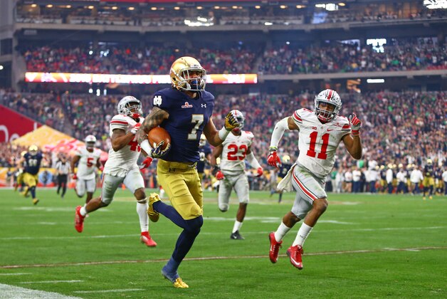 Jan 1, 2016; Glendale, AZ, USA; Notre Dame Fighting Irish wide receiver Will Fuller (7) runs for a touchdown against the Ohio State Buckeyes during the 2016 Fiesta Bowl at University of Phoenix Stadium. The Buckeyes defeated the Fighting Irish 44-28. Mandatory Credit: Mark J. Rebilas-USA TODAY Sports