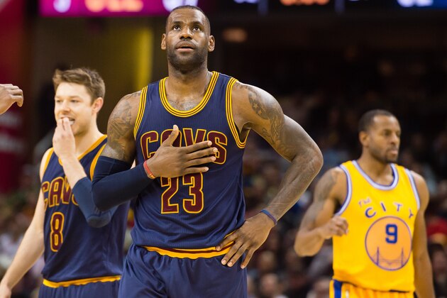 CLEVELAND, OH - JANUARY 18: LeBron James #23 of the Cleveland Cavaliers reacts during the second half against the Golden State Warriors at Quicken Loans Arena on January 18, 2016 in Cleveland, Ohio. The Warriors defeated the Cavaliers 132-98. NOTE TO USER: User expressly acknowledges and agrees that, by downloading and/or using this photograph, user is consenting to the terms and conditions of the Getty Images License Agreement. Mandatory copyright notice. (Photo by Jason Miller/Getty Images)