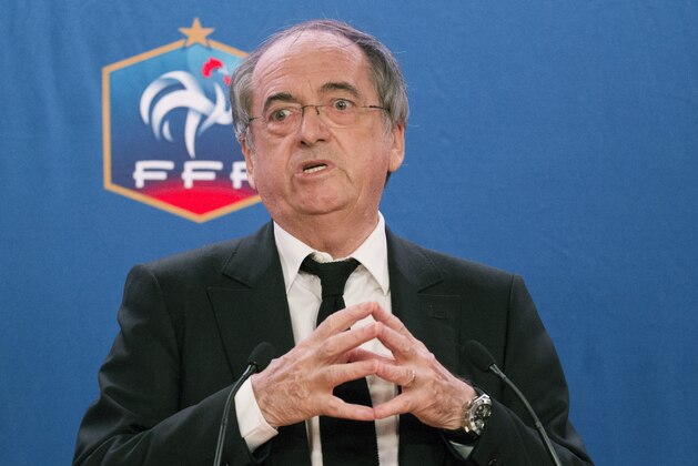 French Football Federation President Noel Le Graet gestures during a press conference in Paris, France.  Thursday Dec. 10  2015. Striker Karim Benzema has been indefinitely suspended from the France team over his involvement in an ongoing blackmail case, throwing a major doubt over his international career. FFF president Noel Le Great announced the decision Thursday, saying “I have decided that he is not available for selection.” The Real Madrid star has been charged with conspiracy to blackmail, relating to an extortion scam over a sex tape featuring France teammate Mathieu Valbuena. (AP Photo/Jacques Brinon)