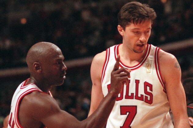 Chicago Bulls' Michael Jordan scolds Atlanta Hawks' Dikembe Mutombo, not shown, as Bulls' Toni Kukoc looks on during the third quarter Tuesday, May 6, 1997, in Chicago.  (AP Photo/Fred Jewell)