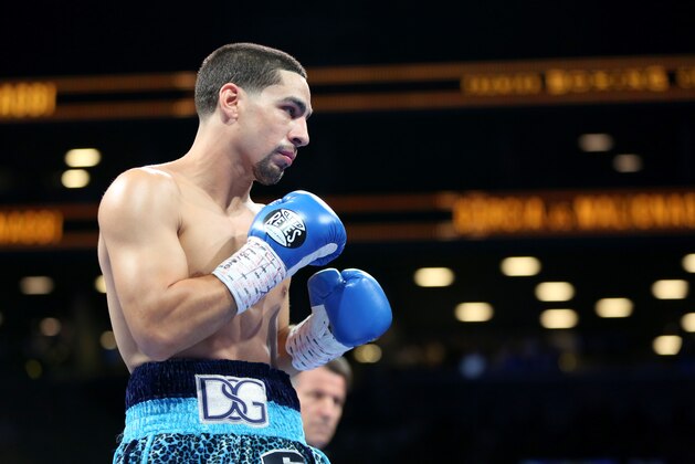 Danny Garcia in action against Paul Malignaggi during their welterweight fight at the Barclays Center in Brooklyn, on Saturday, August 1, 2015. Garcia won via TKO in Round 9.  (AP Photo/Gregory Payan)