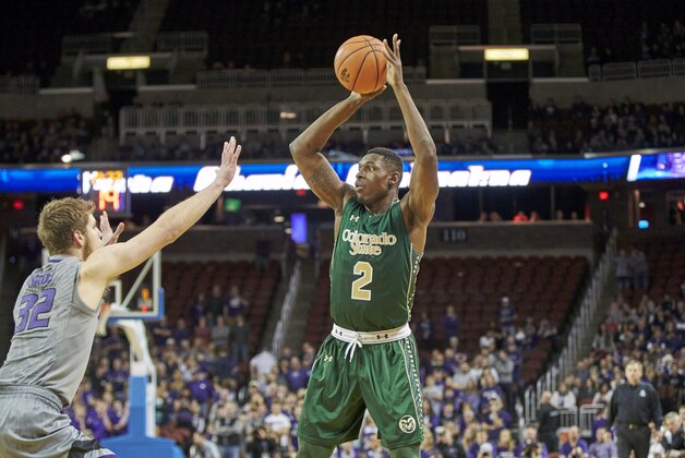 Dec 19, 2015; Wichita, KS, USA; Colorado State Rams forward Emmanuel Omogbo (2) looks to pass the ball as Kansas State Wildcats forward Dean Wade (32) is defending at Intrust Bank Arena. Mandatory Credit: Gary Rohman-USA TODAY Sports