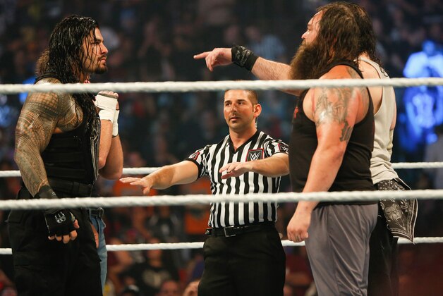 NEW YORK, NY - AUGUST 23:  Roman Reigns and Bray Wyatt stare each other down at the WWE SummerSlam 2015 at Barclays Center of Brooklyn on August 23, 2015 in New York City.  (Photo by JP Yim/Getty Images)