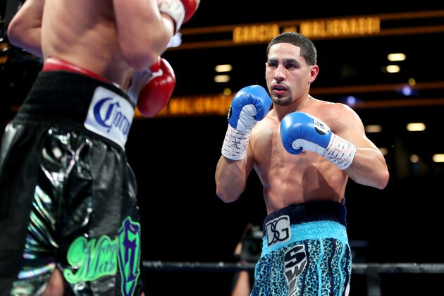 Danny Garcia in action against Paul Malignaggi during their welterweight fight at the Barclays Center in Brooklyn, on Saturday, August 1, 2015. Garcia won via TKO in Round 9.  (AP Photo/Gregory Payan)
