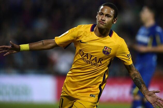 Barcelona's Brazilian forward Neymar celebrates after scoring a goal during the Spanish league football match Getafe CF vs FC Barcelona at the Coliseum Alfonso Perez stadium in Getafe on October 31, 2015.   AFP PHOTO / JAVIER SORIANO        (Photo credit should read JAVIER SORIANO/AFP/Getty Images)