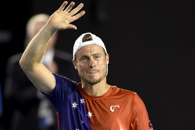 Lleyton Hewitt of Australia waves to the crowd after his second round loss to David Ferrer of Spain at the Australian Open tennis championships in Melbourne, Australia, Thursday, Jan. 21, 2016.(AP Photo/Andrew Brownbill) Lleyton Hewitt of Australia waves to the crowd after his second round loss to David Ferrer of Spain at the Australian Open tennis championships in Melbourne, Australia, Thursday, Jan. 21, 2016.(AP Photo/Andrew Brownbill)