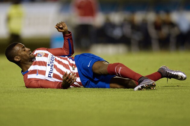 Atletico Madrid's Colombian forward Jackson Martinez lies on the ground during the Spanish Copa del Rey (King's Cup) football match Celta Vigo vs Club Atletico de Madrid at the Balaidos stadium in Vigo on January 20, 2016.  The match ended with a 0-0 draw. AFP PHOTO / MIGUEL RIOPA / AFP / MIGUEL RIOPA        (Photo credit should read MIGUEL RIOPA/AFP/Getty Images)