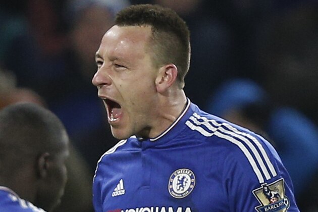 Chelsea's English defender John Terry (C) celebrates scoring a late equalising goal to make the score 3-3 during the English Premier League football match between Chelsea and Everton at Stamford Bridge in London on January 16, 2016. AFP PHOTO / ADRIAN DENNIS

RESTRICTED TO EDITORIAL USE. No use with unauthorized audio, video, data, fixture lists, club/league logos or 'live' services. Online in-match use limited to 75 images, no video emulation. No use in betting, games or single club/league/player publications. / AFP / ADRIAN DENNIS        (Photo credit should read ADRIAN DENNIS/AFP/Getty Images)