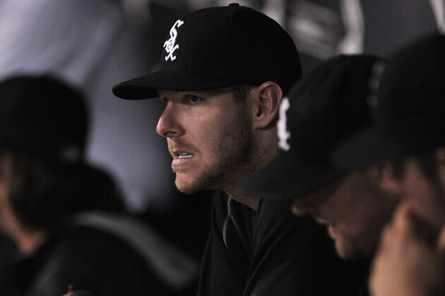Chicago White Sox pitcher Chris Sale looks on in the dugout during the first inning of a baseball game against the Oakland Athletics Wednesday, Sept. 16, 2015 in Chicago. (AP Photo/Paul Beaty)