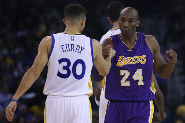 Los Angeles Lakers' Kobe Bryant, right, greets Golden State Warriors' Stephen Curry (30) prior to an NBA basketball game Thursday, Jan. 14, 2016, in Oakland, Calif. (AP Photo/Ben Margot)
