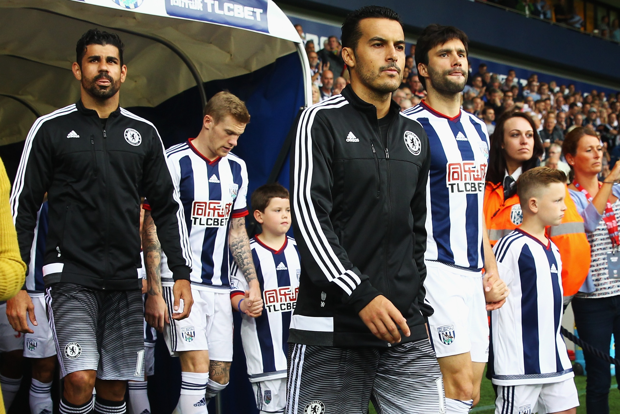 WEST BROMWICH, ENGLAND - AUGUST 23: Pedro of Chelsea walks out with Diego Costa (L) during the Barclays Premier League match between West Bromwich Albion and Chelsea at The Hawthorns on August 23, 2015 in West Bromwich, England.  (Photo by Julian Finney/Getty Images)