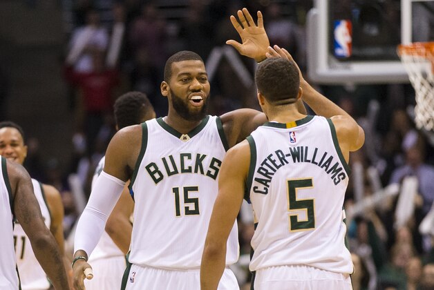 Dec 7, 2015; Milwaukee, WI, USA; Milwaukee Bucks center Greg Monroe (15) and guard Michael Carter-Williams (5) celebrate following a basket during the fourth quarter against the Portland Trail Blazers at BMO Harris Bradley Center.  Milwaukee won 90-88.  Mandatory Credit: Jeff Hanisch-USA TODAY Sports