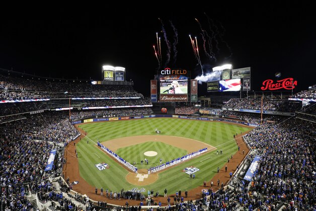 Fireworks are seen over Citi Field before Game 1 of the National League baseball championship series between the New York Mets and the Chicago Cubs Saturday, Oct. 17, 2015, in New York. (AP Photo/Frank Franklin II)