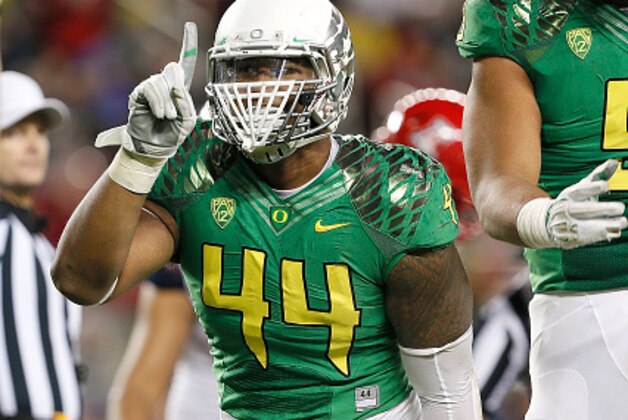 SANTA CLARA, CA - DECEMBER 05: DeForest Buckner #44 of the Oregon Ducks celebrates in front of fans during the first half of the PAC-12 Championships against the Arizona Wildcats at Levi's Stadium on December 5, 2014 in Santa Clara, California. (Photo by Brian Bahr/Getty Images)