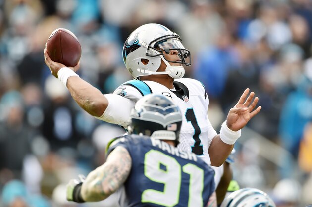 CHARLOTTE, NC - JANUARY 17:  Quarterback Cam Newton #1 of the Carolina Panthers passes during the NBC Divisional Playoff Game against the Seattle Seahawks at Bank of America Stadium on January 17, 2016 in Charlotte, North Carolina. (Photo by Ronald C. Modra/Sports Imagery/Getty Images)