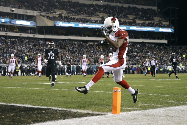 Arizona Cardinals' John Brown scores a touchdown during the second half of an NFL football game against the Philadelphia Eagles, Sunday, Dec. 20, 2015, in Philadelphia. (AP Photo/Matt Rourke)
