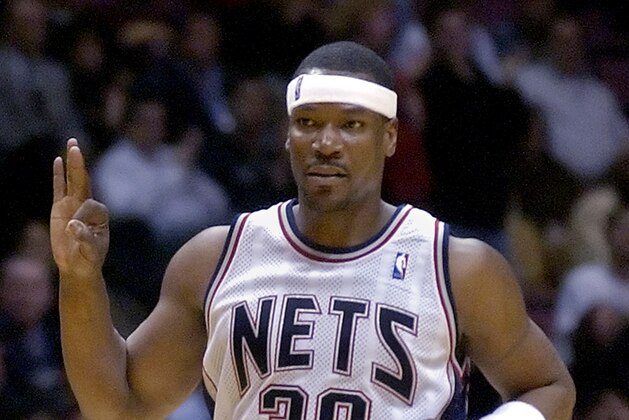** FILE ** New Jersey Nets' Clifford Robinson reacts after hitting a three-point shot during fourth quarter NBA basketball against the Minnesota Timberwolves in this March 23, 2006 photo, in East Rutherford, N.J. Robinson was suspended five games without pay by the NBA on Friday after violating terms of the league's drug policy for the second time in two seasons.  (AP Photo/Bill Kostroun)