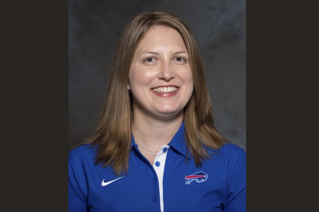 FILE - A May 2015 photo shows Kathryn Smith of the Buffalo Bills NFL football team. The Bills promoted Smith to be their special teams quality control coach, making her the first full-time female member of an NFL coaching staff. The team announced the move in a release Wednesday night, Jan. 20, 2016. Smith was an administrative assistant this season for Bills assistant coaches under Rex Ryan, with whom she has worked for seven years. (AP Photo/File)