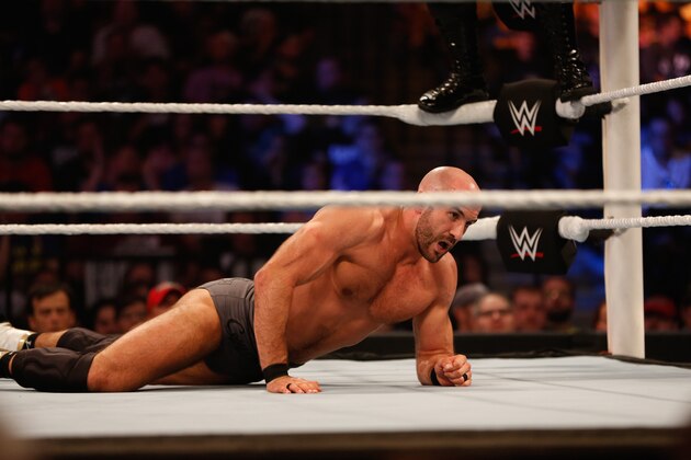 NEW YORK, NY - AUGUST 23: Cesaro recovers after a hit from Kevin Owens at the WWE SummerSlam 2015 at Barclays Center of Brooklyn on August 23, 2015 in New York City.  (Photo by JP Yim/Getty Images)