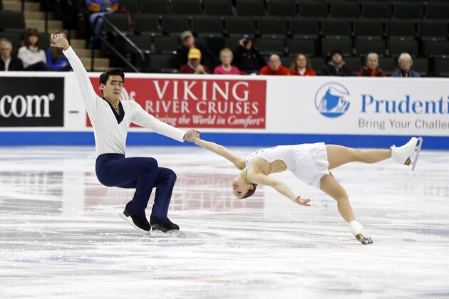 Pairs skaters Madeline Aaron and Max Settiage perform in the short program of the U.S. Figure Skating Championships, Thursday, Jan. 21, 2016, in St. Paul, Minn. (AP Photo/Jim Mone)