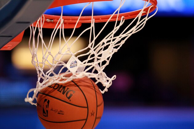 ORLANDO, FL - FEBRUARY 26: A detail of an official Spalding basketball going through the net with an offical logo of the 2012 Orlando NBA All-Star Game during the 2012 NBA All-Star Game at the Amway Center on February 26, 2012 in Orlando, Florida. NOTE TO USER: User expressly acknowledges and agrees that, by downloading and or using this photograph, User is consenting to the terms and conditions of the Getty Images License Agreement. (Photo by Ronald Martinez/Getty Images) ORLANDO, FL - FEBRUARY 26: A detail of an official Spalding basketball going through the net with an offical logo of the 2012 Orlando NBA All-Star Game during the 2012 NBA All-Star Game at the Amway Center on February 26, 2012 in Orlando, Florida. NOTE TO USER: User expressly acknowledges and agrees that, by downloading and or using this photograph, User is consenting to the terms and conditions of the Getty Images License Agreement. (Photo by Ronald Martinez/Getty Images)