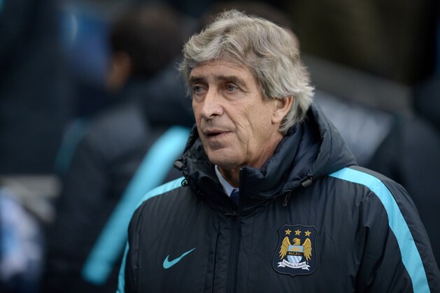 Manchester City's Chilean manager Manuel Pellegrini arrives ahead of the English Premier League football match between Manchester City and Crystal Palace at the Etihad Stadium in Manchester, north west England, on January 16, 2016. AFP PHOTO / OLI SCARFF

RESTRICTED TO EDITORIAL USE. No use with unauthorized audio, video, data, fixture lists, club/league logos or 'live' services. Online in-match use limited to 75 images, no video emulation. No use in betting, games or single club/league/player publications. / AFP / OLI SCARFF        (Photo credit should read OLI SCARFF/AFP/Getty Images)