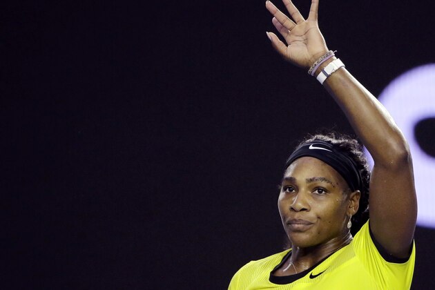 Serena Williams of the United States waves after defeating Daria Kasatkina of Russia in their third round match at the Australian Open tennis championships in Melbourne, Australia, Friday, Jan. 22, 2016.(AP Photo/Aaron Favila)