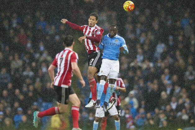 Manchester City's Bacary Sagna, right, fights for the ball against Southampton's Virgil van Dijk during the English Premier League soccer match between Manchester City and Southampton at the Etihad Stadium, Manchester, England, Saturday Nov. 28, 2015. (AP Photo/Jon Super) Manchester City's Bacary Sagna, right, fights for the ball against Southampton's Virgil van Dijk during the English Premier League soccer match between Manchester City and Southampton at the Etihad Stadium, Manchester, England, Saturday Nov. 28, 2015. (AP Photo/Jon Super)