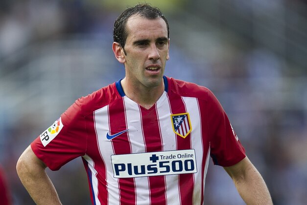 SAN SEBASTIAN, SPAIN - OCTOBER 18:  Diego Godin of Atletico de Madrid reacts during the La Liga match between Real Sociedad de Futbol and Atletico de Madrid at Estadio Anoeta on October 18, 2015 in San Sebastian, Spain.  (Photo by Juan Manuel Serrano Arce/Getty Images)