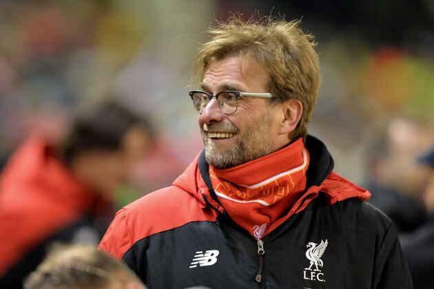 Liverpool's German manager Jurgen Klopp smiles as he arrives ahead of the English FA Cup third round replay football match between Liverpool and Exeter City at Anfield in Liverpool, north west England on January 20, 2016. AFP PHOTO / PAUL ELLIS

RESTRICTED TO EDITORIAL USE. No use with unauthorized audio, video, data, fixture lists, club/league logos or 'live' services. Online in-match use limited to 75 images, no video emulation. No use in betting, games or single club/league/player publications. / AFP / PAUL ELLIS        (Photo credit should read PAUL ELLIS/AFP/Getty Images)