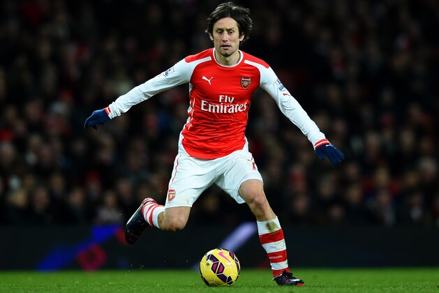 LONDON, ENGLAND - FEBRUARY 10:  Tomas Rosicky of Arsenal in action during the Barclays Premier League match between Arsenal and Leicester City at Emirates Stadium on February 10, 2015 in London, England.  (Photo by Michael Regan/Getty Images)