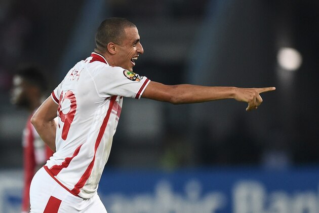 Tunisia's forward Ahmed Akaichi celebrates after scoring a goal during the 2015 African Cup of Nations quarter-final football match between Equatorial Guinea and Tunisia in Bata on January 31, 2015.  AFP PHOTO / CARL DE SOUZA        (Photo credit should read CARL DE SOUZA/AFP/Getty Images)