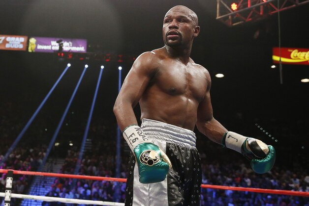 Floyd Mayweather Jr. looks at Andre Berto during their welterweight title boxing bout Saturday, Sept. 12, 2015, in Las Vegas. (AP Photo/John Locher)