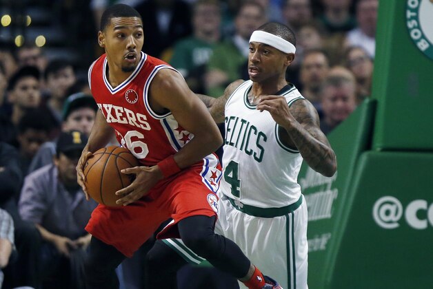 Boston Celtics' Isaiah Thomas (4) defends against Philadelphia 76ers' Phil Pressey (26) during the first quarter of an NBA basketball game in Boston, Wednesday, Nov. 25, 2015. (AP Photo/Michael Dwyer)