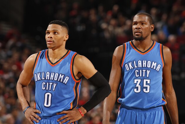 PORTLAND, OR - JANUARY 10:  Russell Westbrook #0 of the Oklahoma City Thunder and Kevin Durant #35 of the Oklahoma City Thunder during the game against the Portland Trail Blazers on January 10, 2016 at the Moda Center in Portland, Oregon. NOTE TO USER: User expressly acknowledges and agrees that, by downloading and or using this Photograph, user is consenting to the terms and conditions of the Getty Images License Agreement. Mandatory Copyright Notice: Copyright 2016 NBAE (Photo by Cameron Browne/NBAE via Getty Images)