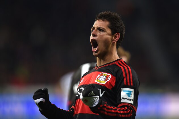 Leverkusen's Mexican striker Javier Hernandez celebrates after scoring his team's second goal during the German first division Bundesliga football match Bayer 04 Leverkusen vs Borussia Moenchengladbach in Leverkusen, western Germany, on December 12, 2015. AFP PHOTO / PATRIK STOLLARZ

RESTRICTIONS: DURING MATCH TIME: DFL RULES TO LIMIT THE ONLINE USAGE TO 15 PICTURES PER MATCH AND FORBID IMAGE SEQUENCES TO SIMULATE VIDEO. == RESTRICTED TO EDITORIAL USE == FOR FURTHER QUERIES PLEASE CONTACT DFL DIRECTLY AT + 49 69 650050. / AFP / PATRIK STOLLARZ        (Photo credit should read PATRIK STOLLARZ/AFP/Getty Images)