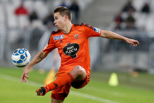 BORDEAUX, FRANCE - JANUARY 12:  Raphael Guerreiro for Lorient in action during the French League Cup quarter final between Bordeaux and Lorient at Stade Matmut Atlantique on January 12, 2016 in Bordeaux, France. (Photo by Romain Perrocheau/Getty Images)