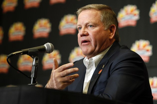 Notre Dame head coach Brian Kelly speaks during media day for the Fiesta Bowl NCAA college football game, Wednesday, Dec. 30, 2015, in Scottsdale, Ariz. Notre Dame plays Ohio State on New Year's Day. (AP Photo/Rick Scuteri)