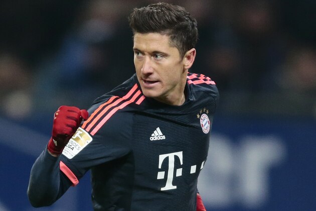 HAMBURG, GERMANY - JANUARY 22:  Robert Lewandowski of Munich celebrates after scoring their first goal during the Bundesliga match between Hamburger SV and FC Bayern Muenchen at Volksparkstadion on January 22, 2016 in Hamburg, Germany.  (Photo by Oliver Hardt/Getty Images)