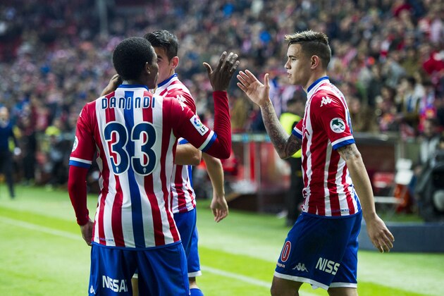 GIJON, SPAIN - JANUARY 21:  Arnaldo Sanabria (R) of Real Sporting de Gijon celebrates with his teammate Daniel Ndi of Real Sporting de Gijon after scoring his team's fourth goal during the La Liga match between Real Sporting de Gijon and Real Sociedad de Futbol at Estadio El Molinon on January 21, 2016 in Gijon, Spain.  (Photo by Juan Manuel Serrano Arce/Getty Images)