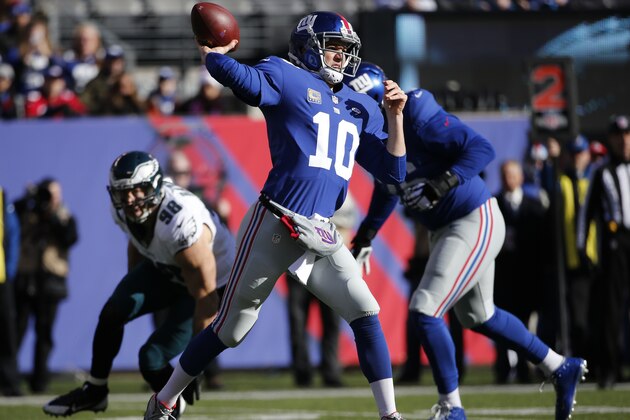 New York Giants quarterback Eli Manning (10) throws against the Philadelphia Eagles during the first quarter of an NFL football game, Sunday, Jan. 3, 2016, in East Rutherford, N.J. (AP Photo/Kathy Willens)