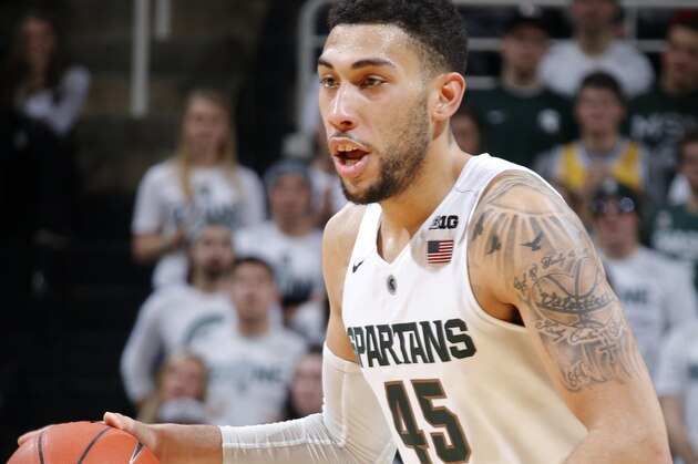 Michigan State's Denzel Valentine drives against Nebraska during the first half of an NCAA college basketball game, Wednesday, Jan. 20, 2016, in East Lansing, Mich. (AP Photo/Al Goldis)